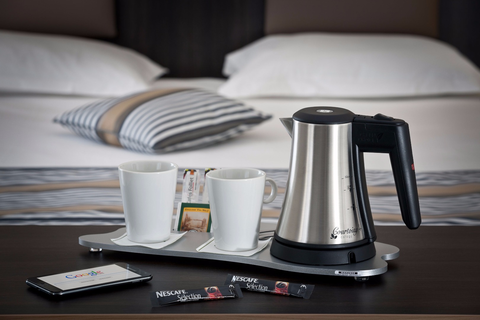 Courtoisy tray with sticks of coffee ad tea bags